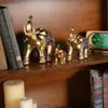 Golden Resin Elephant Statue Feng Shui Elegant Elephant Trunk Sculpture Lucky Wealth Figurine Crafts Ornaments For Home Decor 231227