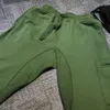 Pantaloni funzionali sottili come la pietra Tasche laterali con logo Leggings sportivi basic da uomo e da donna Versatile Nero Verde militare