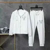 2024 Summer Fashion Mens Tracksuits 하와이 비치 바지 세트 디자이너 셔츠 인쇄 레저 셔츠 맨 슬림 한 짧은 소매 짧은 해변 보드 M-3XL