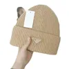 Bonnet de créateur Bonnets Casquettes de crâne Chapeaux Chapeaux Nouveau triangle d'automne et d'hiver P hivers standard bonnet tricoté en laine parent-enfant Son Hers Cap2300