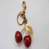 Chaveiro estilo cereja cristal cor vermelha bolsa feminina meninas pingente de carro acessórios de moda bolsa de frutas decoração b6x3