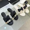 Mode tofflor designer glider kvinnor platt sandaler sommar flip flops damer scuffs strand läder casual klänningskor toffel c29