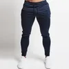 Pantalons pour hommes Marque de mode Vêtements Polyester Slim Fit Couleur unie Sport Vacances Joggers Printemps