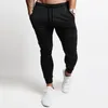 Pantalons pour hommes Marque de mode Vêtements Polyester Slim Fit Couleur unie Sport Vacances Joggers Printemps