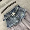 kjol koreanska kvinnliga oregelbundna skiktade nät lapptäcke denim kjol sommar kvinnors höga midja svart tyll asymmetriska jeans kjolar