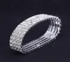 12 stycken Lot 4 Row Crystal Diamante Rhinestone Elastic Bridal Bangle Armband Stretch hela bröllopstillbehör för kvinnor9390115