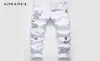 Nuevos hombres Streetwear personalidad rasgados impresos pantalones vaqueros ajustados blancos Hip Hop Punk Casual motocicleta pantalones vaqueros elásticos de mezclilla CX2005926473