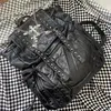 MBTI Goth Y2k Zaini per donna Nero Punk Rivetto Catena Studenti scolastici Borsa in pelle Pu Cross Skeleton Moda Zaini femminili 231228