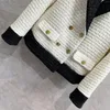 Chaquetas de mujer Traje pequeño en contraste clásico retro en blanco y negro de alto grado para mujeres en Shenzhen Nanyou Forro de jacquard Tweed grueso