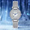 Montres-bracelets Femmes de luxe Montre Sky Star Set avec des coquilles de diamant Points bleus imprimés sur le cadran blanc Diamond-Set Steel Strip Quartz