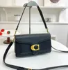 Spegelkvalitet tabby axelpåsar kvinnor luxurys m klaff messenger koppling handväskor purses äkta läder 10a designer crossbody väska kvinna man tote plånbok väskor dhgate