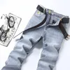 Jeans da uomo Primavera e autunno Pantaloni casual in denim tinta unita slim fit Pantaloni streetwear di lusso da cowboy elasticizzati grigi lavati