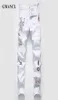 Nieuwe Mannen Streetwear persoonlijkheid Ripped gedrukt witte skinny Jeans Hip Hop Punk Casual motorfiets stretch denim jeans broek CX2001149136