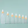 Wholesale Clear Frosted Dropper Bottles 5-100ml With White Rubber Head Wood Grain Circle