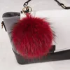 Keychains 15cm Fluffy Real Raccoon Fur Ball Keychain Pom Key Chain Feather Llavero Pompon Keyring Bag Charm Girl Pendant Gifts