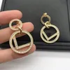 Pendientes de estilo de moda Pendientes de aro de círculo grande europeos y americanos simples Diseño creativo Pendiente de letra redonda geométrica w291S