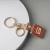 Kreativ handgjorda nyckelkedjelegeringar Parfymflaskan nyckelring Roteston Parfym Keychain för gåvor