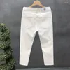 Jeans masculinos de alta qualidade rua coreana magro para primavera e outono com tecido jeans casual sólido branco preto punk calças