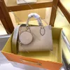 مصمم Onthego Bag Women Women Handbag Fashion Leather Tutes Disual Luxury Brand Lady Strap Counter Counter Bass مع محفظة