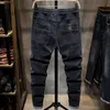 Primavera Autunno Coulisse Vita elastica Denim Jeans Uomo Piedi sottili Pantaloni Moda coreana Casual Harem Baggy 231228