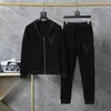 2024 Summer Fashion Mens Tracksuits 하와이 비치 바지 세트 디자이너 셔츠 인쇄 레저 셔츠 맨 슬림 한 짧은 소매 짧은 해변 보드 M-3XL