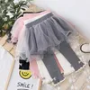 Broek 2023 lente herfst winter baby meisjes mesh tutu rokken broek leggings kinderen kinderen nep broek verjaardag prinses kleding