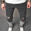 Jeans da uomo 2023 Pantaloni da uomo High Street strappati sfumati slim fit micro svasati Pantaloni alla moda in denim elasticizzato con fori