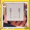 2024 Designer 925 silver needle South Korea's shiny delicate diamond snowflake earrings female fashion exaggerated geometric earrings factory MR9E