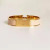 Högkvalitativ designer Design Bangle rostfritt stål guldspänne armband mode smycken män och kvinnor armband 0001286q