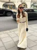 Elegant and loose solid women's knitted long skirt women's O-neck long sleeved pleated dress autumn fashionable street clothing women's robe 231230