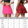 LL-88207 Abiti da yoga da donna Gonne da tennis a vita alta Gonna a pieghe da esercizio Cheerleader Abiti corti Abbigliamento fitness Ragazze che corrono Pantaloni elastici Abbigliamento sportivo Foderato