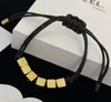 Fashion Europe and America Cube Dice Letter Charm Bracelet Black Rope Chain Designer Brand Stretchable Bracelet Men Women High Quality Lover's Gift