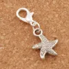 Dança Flake Star Starfish Sea Charms 100 pçs / lote 12 7x29 5mm Antigo Coração de Prata Flutuante Fechos de Lagosta para Vidro Vivendo C123320m