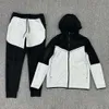 Pista da donna con cappuccio uomo uomo uomo primavera e tuta autunnale Nuovo cappotto di abbigliamento sportivo cappotto casual Pantaloni di guardia a piede per due pezzi set all'ingrosso all'ingrosso