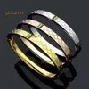 Bangle 2024 Nuovo braccialetto doppio di lusso Snap Bangle Bracciale Moda Coppia Uomo Donna Bracciale Classico Designer in acciaio inossidabile Braccialetti di moda Gioielli regalo