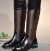 Damen-Martin-Cowboy-Schneestiefel aus schwarzem Leder mit luxuriösen High Heels aus Holz