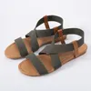 Sandaler Solid Flat med kvinnors skor till försäljning 2023 Fashion Summer Elastic Band Gladiator Fabric