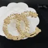 c18kラインストーン装飾を備えた金メッキのロータスブローチ