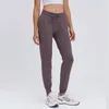 LL Yoga Sweatpants Dance Studio Relaxed-Fit Mid-Rise Jogger full längd Mjuk tröja avsmalnande sportbyxor Comfort Comfort Drawstring Gym City Sweatwear med fickor