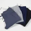 LL Pantalones deportivos de yoga Estudio de danza Jogger de talle medio de ajuste relajado Jersey suave de longitud completa Pantalones deportivos cónicos Comodidad informal Cordón Gimnasio Sudadera urbana con bolsillos