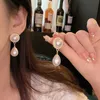 2024 Designer S925 Silver Needle Light Luxury Small Pearl Earrings Women's Versatile Temperament Cat Eye Stone Ear Studs Advanced Design Ear Jewelry factory outlet