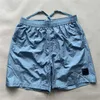 Herren-Badeshorts, Sommer-Designer-Shorts, Outdoor-Hipster, lässig, lockere Passform, schnell trocknend, kurze 5-Punkt-Hose aus metallischem Nylon, Marke kürzer