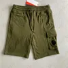 MENS KORT BANT SOMMER Strand Swim Shorts CP Kläder mode koreansk lös avslappnad korta svettbyxor populära ungdomsdesigner shorts