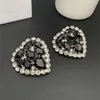 Boucles d'oreilles dos 2024 célèbre marque de créateur boucle d'oreille coeur en cristal noir grand clip d'oreille femme bijoux de luxe de qualité supérieure cadeau de fête d'anniversaire