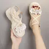 Sandali 2023 Sandalo Fiore Fata Gentle Muffin Scarpe rialzate romane Versione coreana Tacchi grandi da donna alti