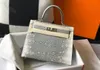 Damen-Designerhandtasche mit Eidechsenmuster, silberne Beschläge, Umhängetasche aus Rindsleder, modische Handtasche, 2024 neue berühmte Marke