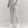 Pantalon homme coupe décontractée survêtement taille élastique mince solide Sport Cargo pantalon mode salopette randonnée pantalons de survêtement 2023 printemps