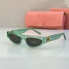 Miuiサングラスデザイナー女性Miumiusヨーロッパ系アメリカ人スタイルのトレンド狭いAvantgarde Cat Eye Design Tortoise Shell Sunglasses Acetate Frame