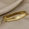 Bangle Simple Trendy rostfritt stål fasta armband för kvinnor vattentäta smycken minimalistisk slät rund guld silver färg armband