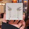 2024 Designer 925 silver needle South Korea's shiny delicate diamond snowflake earrings female fashion exaggerated geometric earrings factory M46E